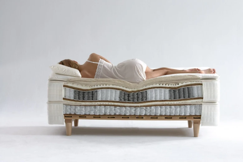 Woman on mattress cross-section